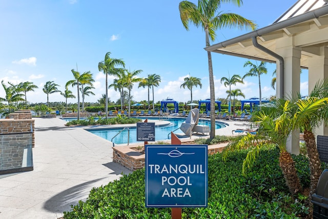community pool with a patio