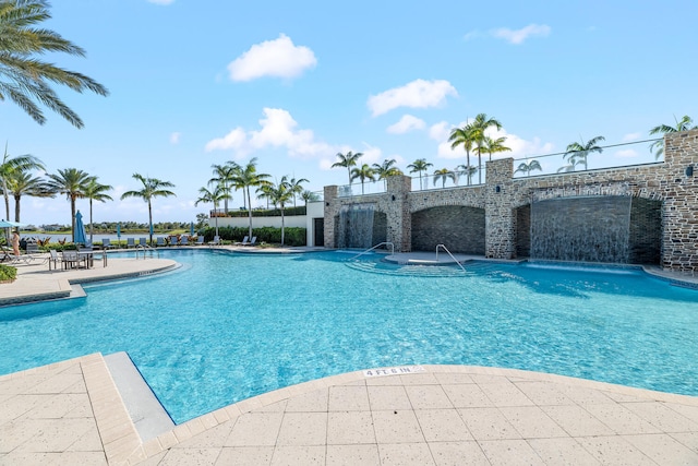 community pool with a patio
