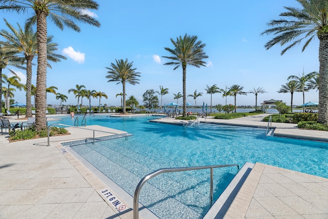community pool featuring a patio area