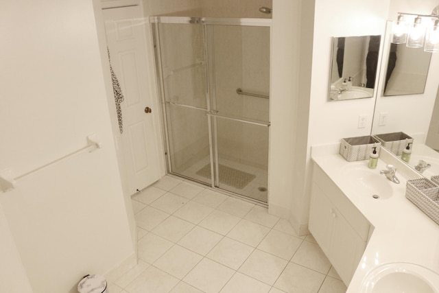12582 Shoreline Dr, Wellington, FL 33414 - bathroom featuring baseboards, a shower stall, tile patterned flooring, and vanity