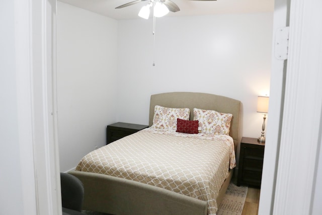 12582 Shoreline Dr, Wellington, FL 33414 - bedroom featuring a ceiling fan and wood finished floors