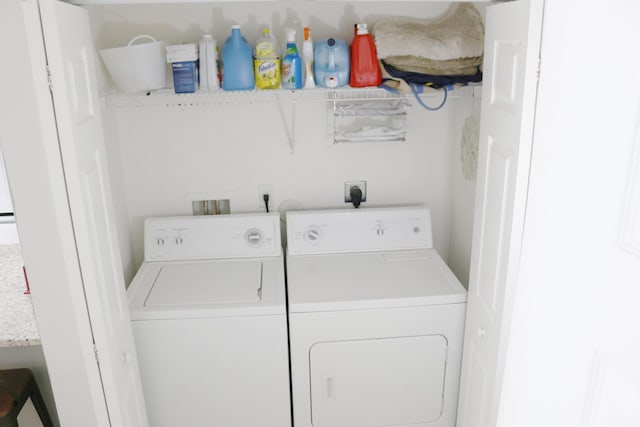 12582 Shoreline Dr, Wellington, FL 33414 - laundry room with laundry area and washing machine and dryer