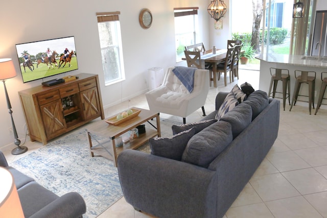 12582 Shoreline Dr, Wellington, FL 33414 - living area with an inviting chandelier and light tile patterned floors