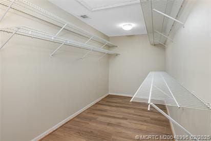 5361 SW Windward Way, Palm City, FL 34990 - spacious closet with wood finished floors