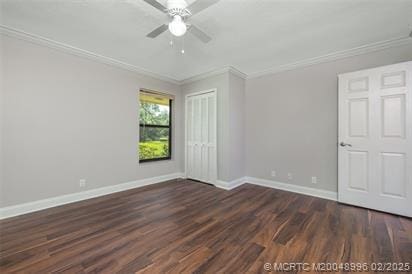 5361 SW Windward Way, Palm City, FL 34990 - unfurnished bedroom featuring ornamental molding, dark wood finished floors, baseboards, a closet, and ceiling fan