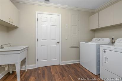 5361 SW Windward Way, Palm City, FL 34990 - clothes washing area featuring cabinet space, washing machine and dryer, crown molding, dark wood finished floors, and baseboards