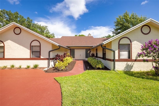 5361 SW Windward Way, Palm City, FL 34990 - single story home featuring a front yard, stucco siding, and a chimney