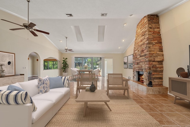 5361 SW Windward Way, Palm City, FL 34990 - living area with a ceiling fan, a fireplace, high vaulted ceiling, and ornamental molding