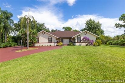 5361 SW Windward Way, Palm City, FL 34990 - single story home featuring a front yard