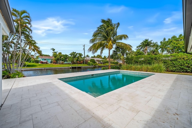 1516 Wagner Cir, Lake Clarke Shores, FL 33406 - pool featuring a water view and a patio area