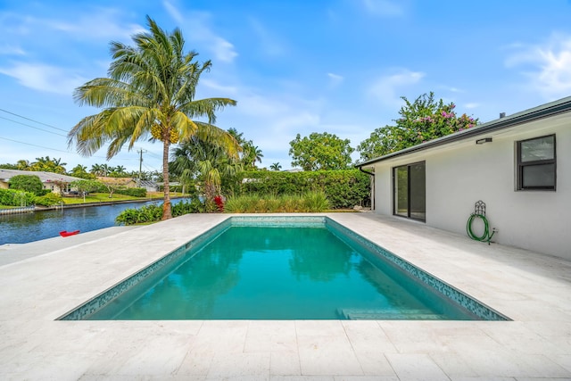 1516 Wagner Cir, Lake Clarke Shores, FL 33406 - pool featuring a water view and a patio area