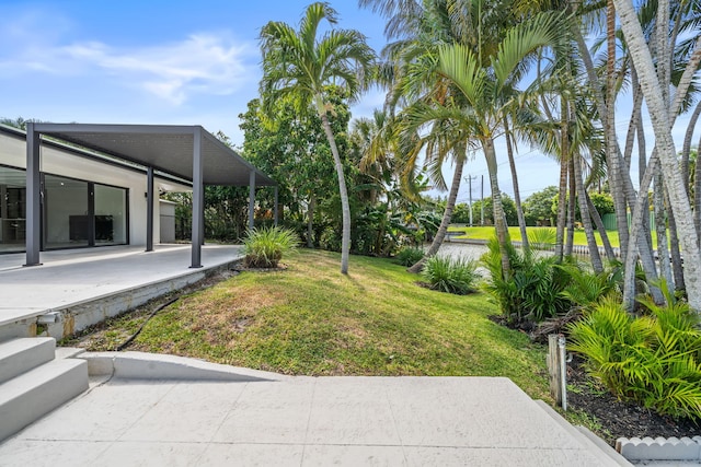 1516 Wagner Cir, Lake Clarke Shores, FL 33406 - view of yard featuring a patio area