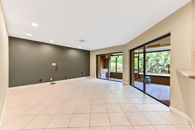 2602 SW 23rd Cranbrook Dr, Boynton Beach, FL 33436 - unfurnished room with recessed lighting, baseboards, and light tile patterned flooring