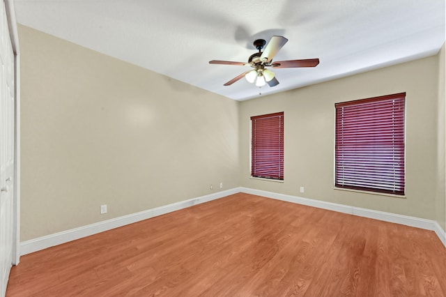 2602 SW 23rd Cranbrook Dr, Boynton Beach, FL 33436 - empty room featuring light wood-style floors, baseboards, and a ceiling fan