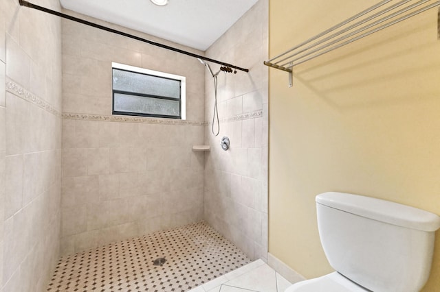 2602 SW 23rd Cranbrook Dr, Boynton Beach, FL 33436 - bathroom with a tile shower, toilet, and tile patterned flooring
