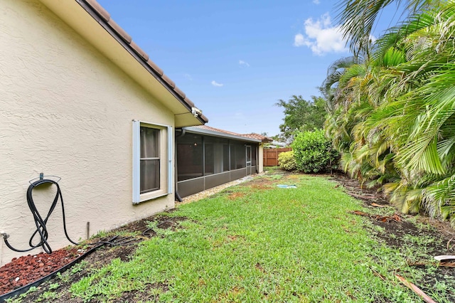 2602 SW 23rd Cranbrook Dr, Boynton Beach, FL 33436 - view of yard featuring a sunroom
