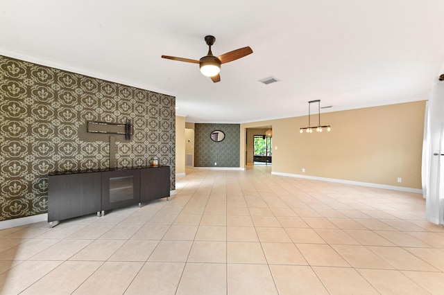 2602 SW 23rd Cranbrook Dr, Boynton Beach, FL 33436 - unfurnished living room with ornamental molding, baseboards, wallpapered walls, a ceiling fan, and an accent wall