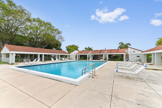 2602 SW 23rd Cranbrook Dr, Boynton Beach, FL 33436 - community pool with a patio area
