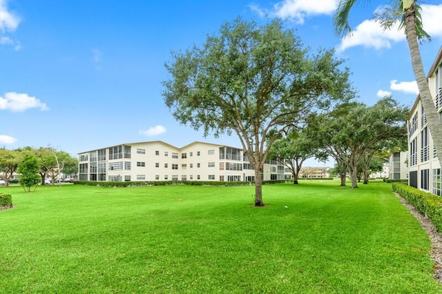 556 Mansfield N, Boca Raton, FL 33434 - surrounding community featuring a yard
