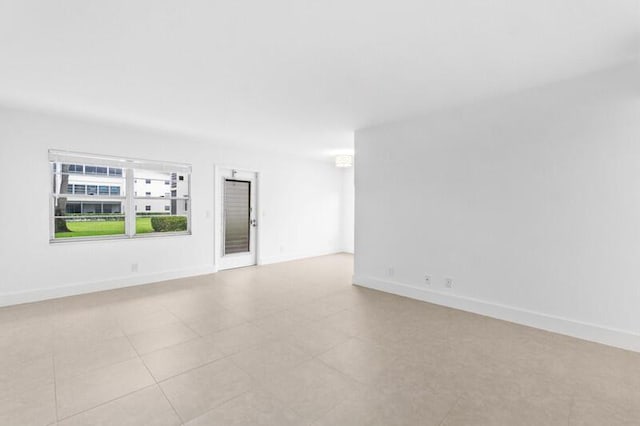 556 Mansfield N, Boca Raton, FL 33434 - empty room with baseboards