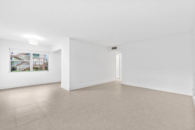 556 Mansfield N, Boca Raton, FL 33434 - spare room with baseboards