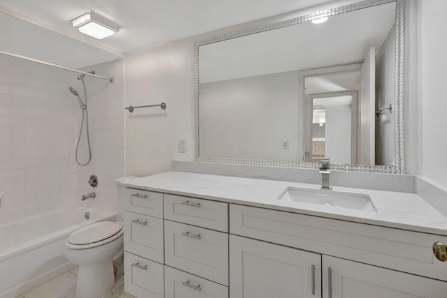 bathroom featuring toilet, bathing tub / shower combination, and vanity