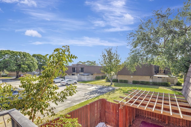 view of yard featuring fence