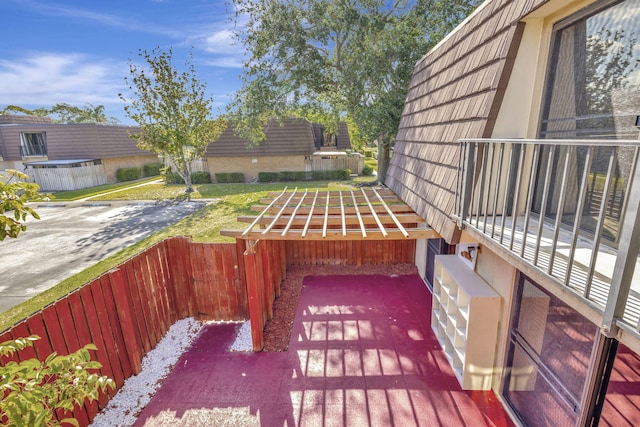 wooden deck featuring fence