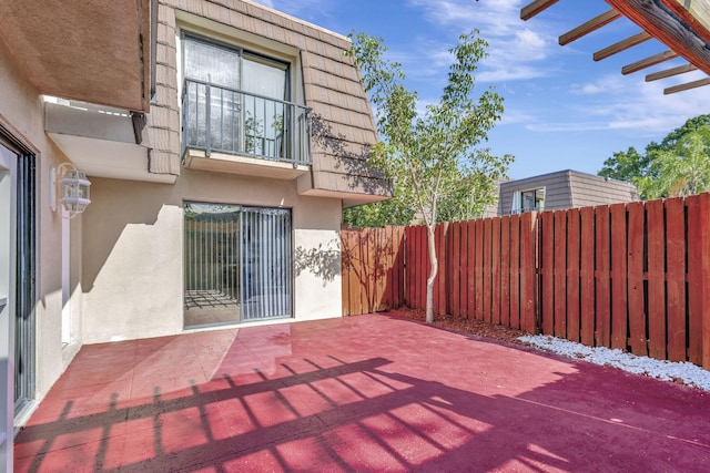 view of patio with fence