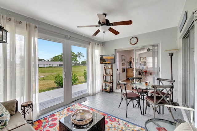 interior space with a ceiling fan