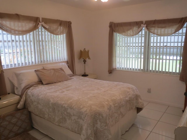 bedroom with tile patterned floors