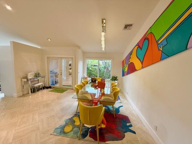 5534 Ainsley Ct, Boynton Beach, FL 33437 - dining space with french doors and recessed lighting
