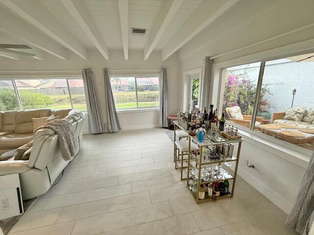 5534 Ainsley Ct, Boynton Beach, FL 33437 - sunroom / solarium featuring beamed ceiling and healthy amount of natural light