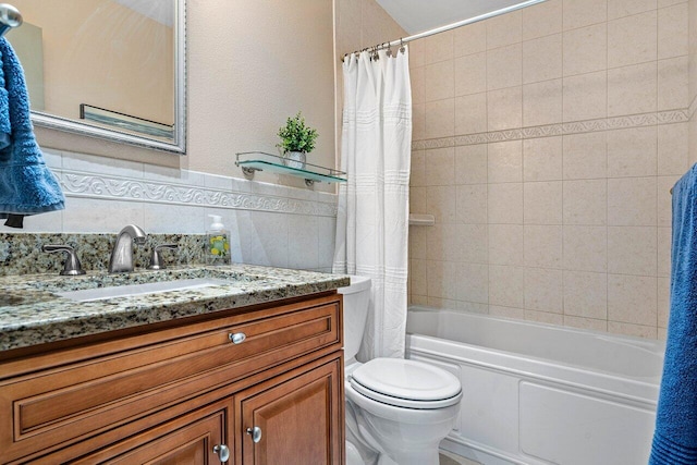 648 Deer Creek Edgewater Dr, Deerfield Beach, FL 33442 - bathroom with vanity, shower / bath combo, toilet, and tile walls