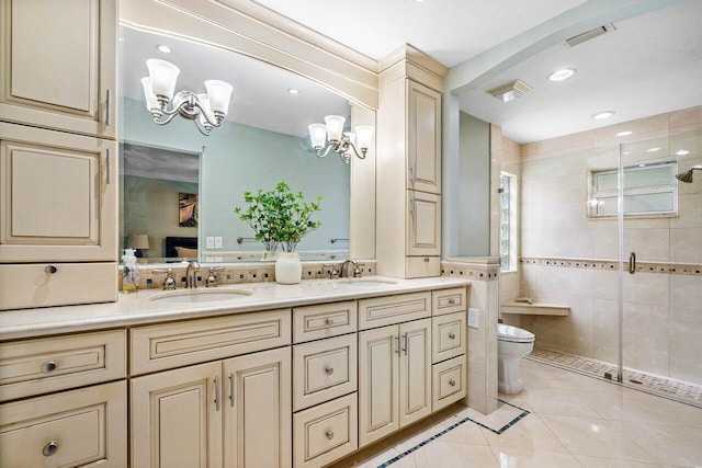 648 Deer Creek Edgewater Dr, Deerfield Beach, FL 33442 - bathroom with toilet, a shower stall, a sink, and tile patterned flooring