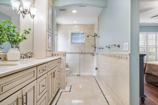 648 Deer Creek Edgewater Dr, Deerfield Beach, FL 33442 - bathroom featuring visible vents, a stall shower, tile patterned floors, and toilet