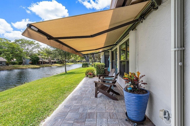 648 Deer Creek Edgewater Dr, Deerfield Beach, FL 33442 - view of patio featuring a water view