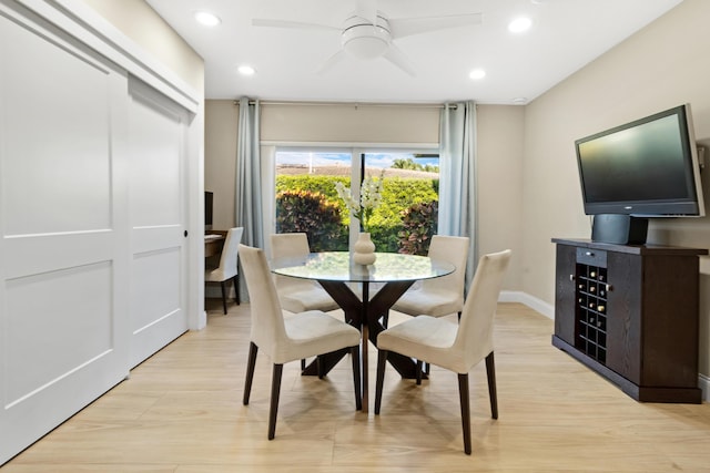dining area with light wood-style floors, recessed lighting, baseboards, and ceiling fan