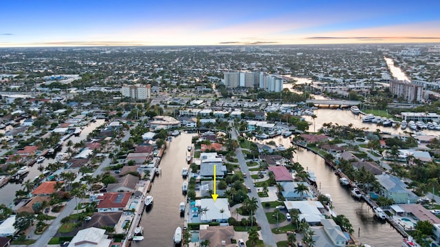 aerial view at dusk of a water view and a city view