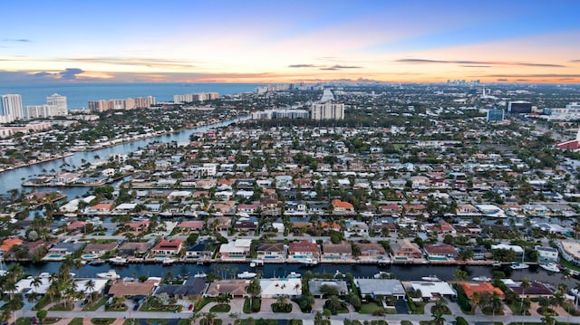 aerial view at dusk of a water view and a city view