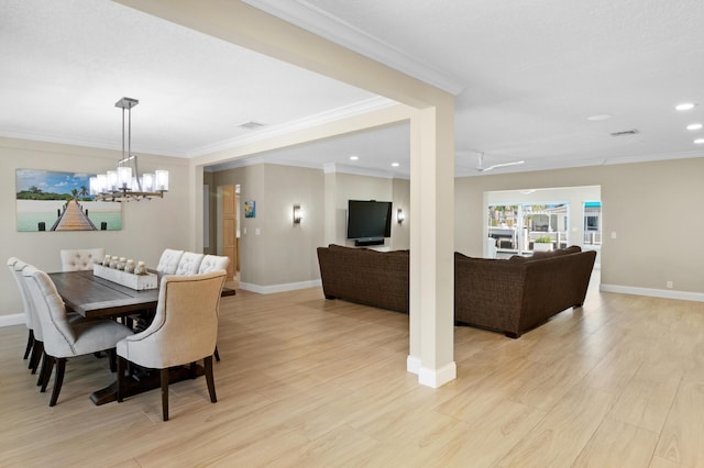 dining space featuring a chandelier, light wood finished floors, baseboards, ornamental molding, and recessed lighting