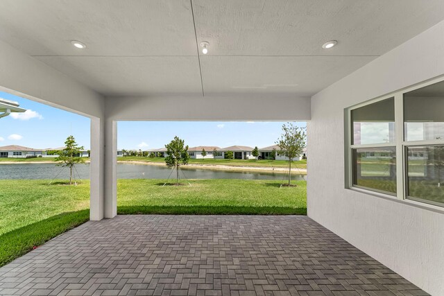 10241 SW Carnelian St, Port Saint Lucie, FL 34987 - view of patio with a water view and a residential view
