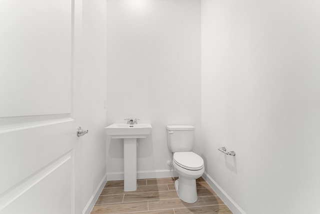 10241 SW Carnelian St, Port Saint Lucie, FL 34987 - half bathroom with baseboards and toilet