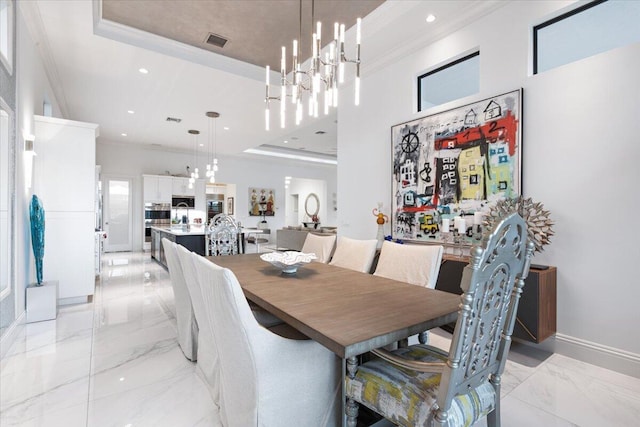 6940 NW 25th Way, Boca Raton, FL 33496 - dining space featuring ornamental molding, a raised ceiling, a chandelier, light marble finish flooring, and recessed lighting