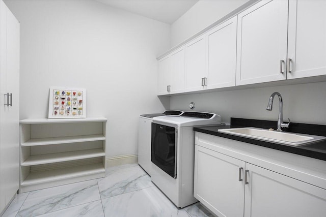 6940 NW 25th Way, Boca Raton, FL 33496 - clothes washing area featuring washing machine and clothes dryer, light marble finish flooring, cabinet space, and baseboards