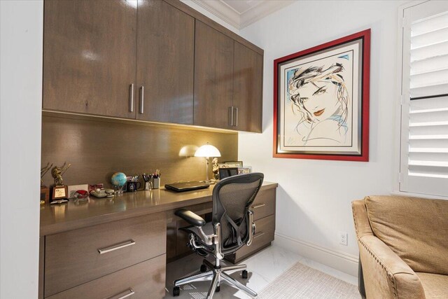 6940 NW 25th Way, Boca Raton, FL 33496 - office area featuring light marble finish floors, baseboards, ornamental molding, and built in study area