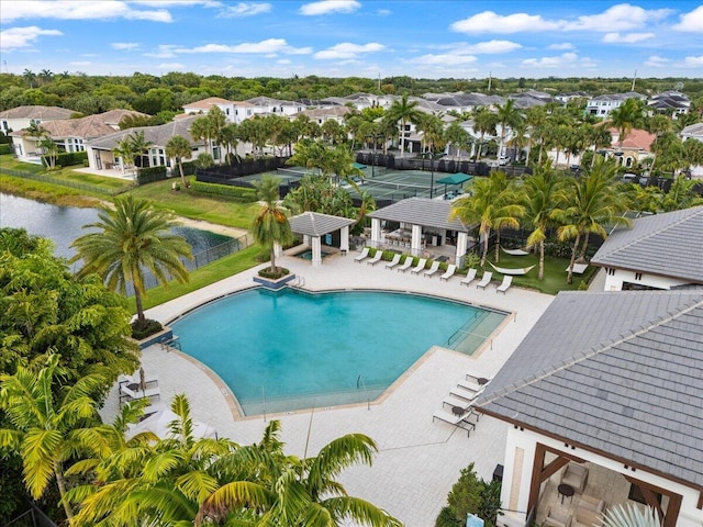 6940 NW 25th Way, Boca Raton, FL 33496 - community pool with a patio and a residential view