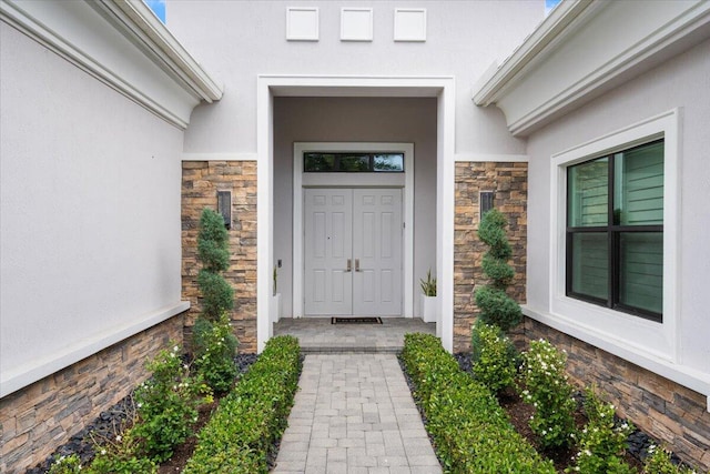 6940 NW 25th Way, Boca Raton, FL 33496 - entrance to property with stone siding and stucco siding
