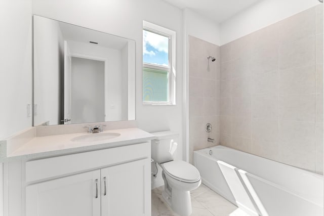 10128 SW Carnelian St, Port Saint Lucie, FL 34987 - bathroom with vanity, shower / tub combination, and toilet