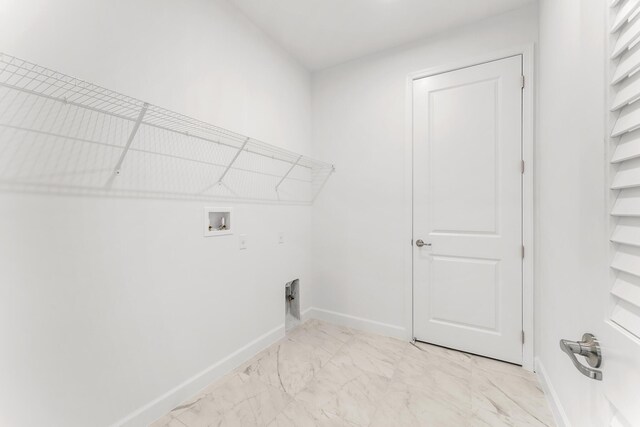 10128 SW Carnelian St, Port Saint Lucie, FL 34987 - clothes washing area with laundry area, marble finish floor, washer hookup, and baseboards